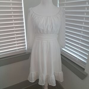 Chic White Midi Dress with Ruffle Hem